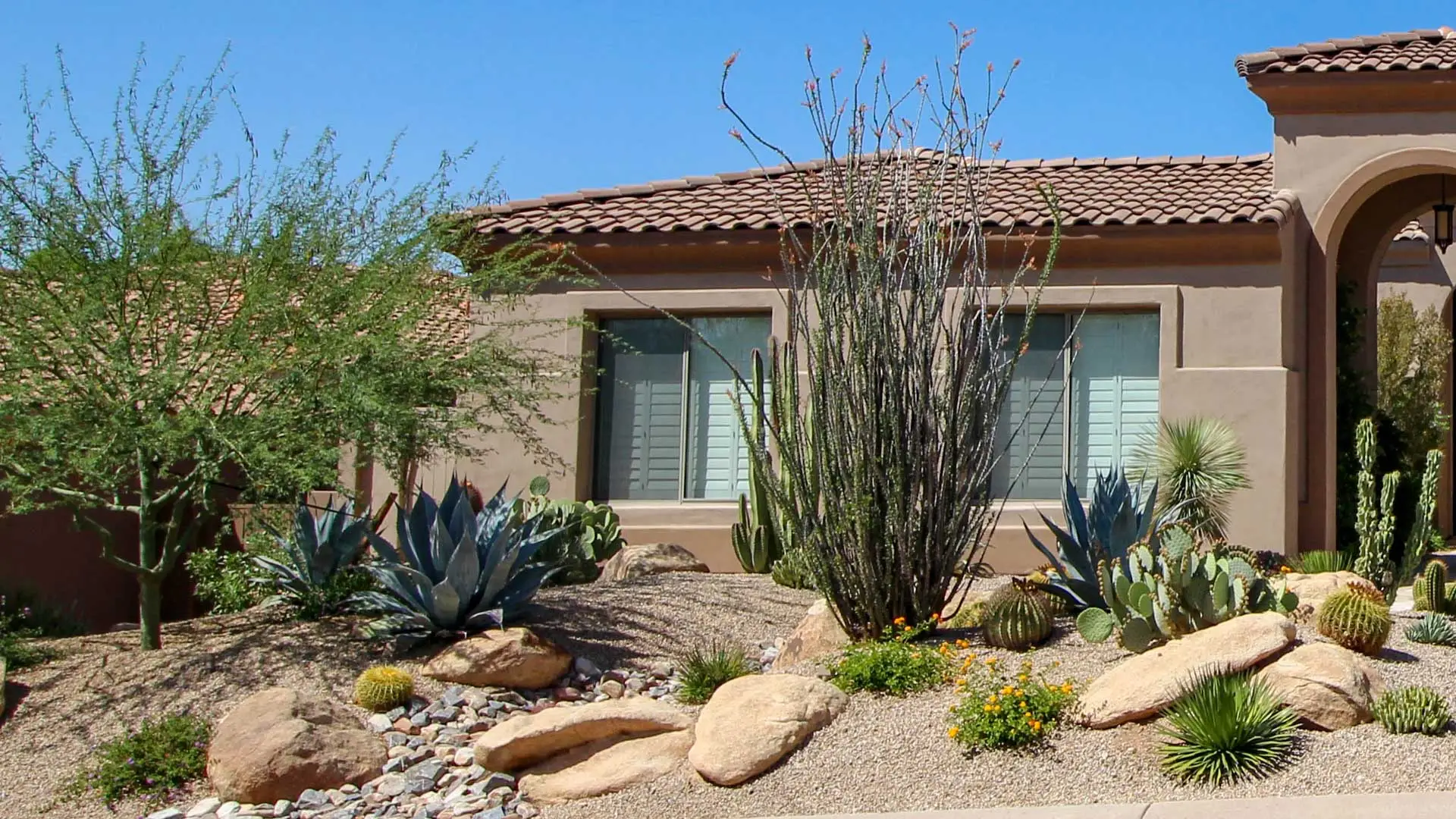 House in El Paso, Tx with new landscape rock installation.