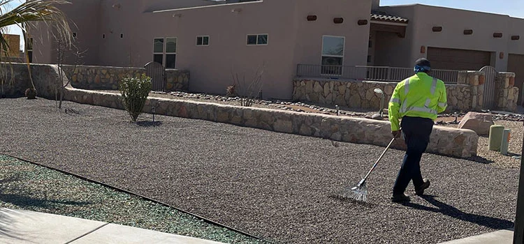 Mower in a lawn providing service in Mesilla, NM.